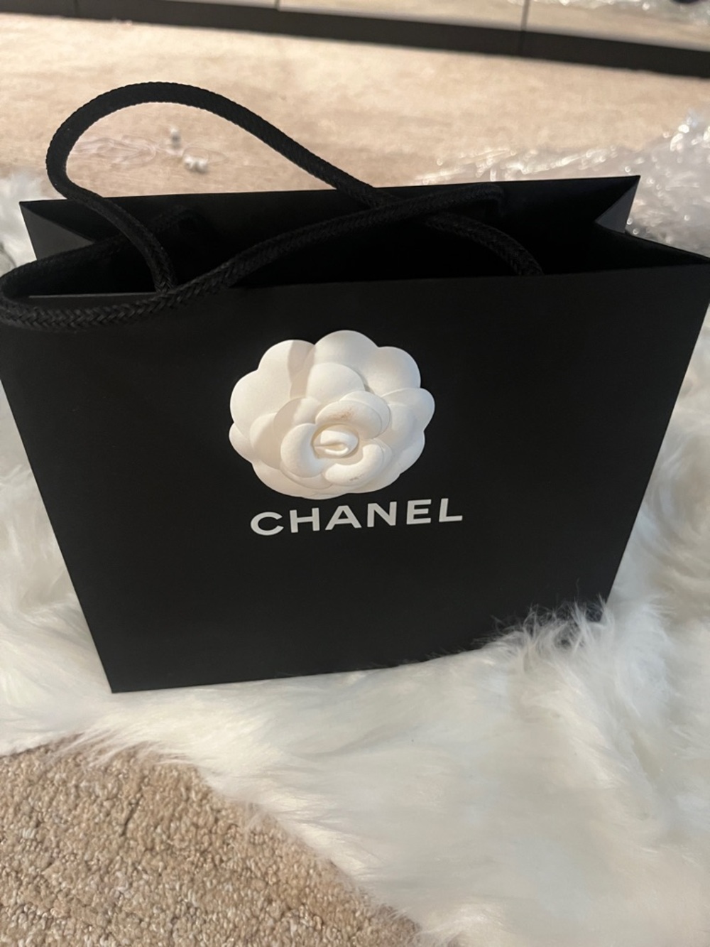CHANEL Black Shopping Bag with White Camellia